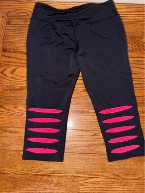 ' Black Capri Leggings with Hot Pink Cutout Accents